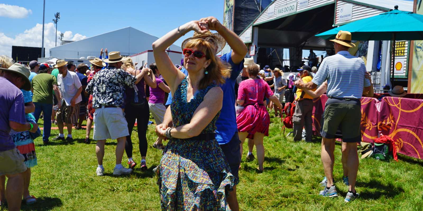 Dancing at the Fais Do Do Stage - Jazz Fest