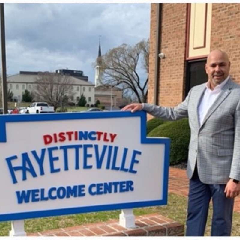 Devin Heath outside of Distinctly Fayetteville