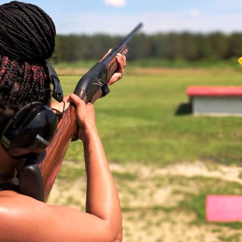 Image of young, black lays shooting at the Fort Bragg Clay Target Center