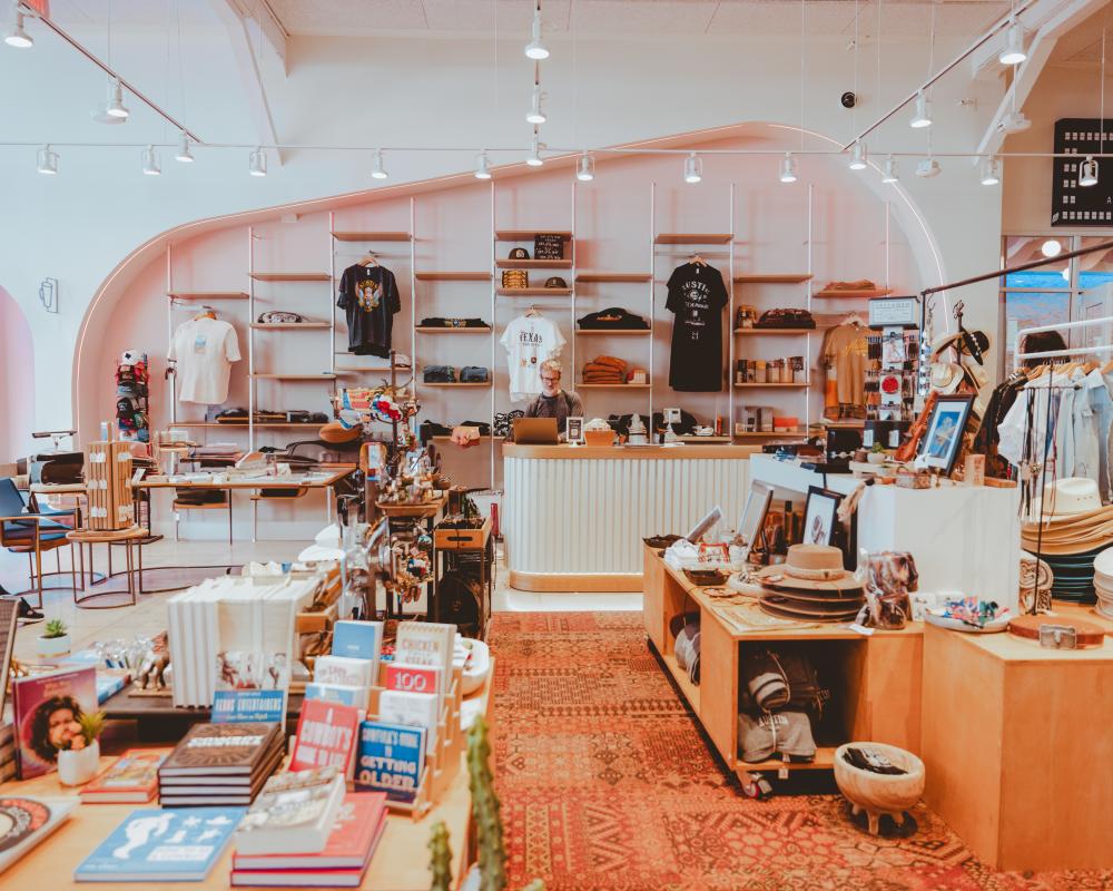 Modern clothing and merchandise displays at the Austin Visitor Center.