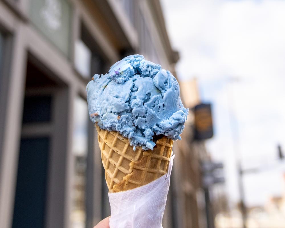 blue ice cream in a waffle cone