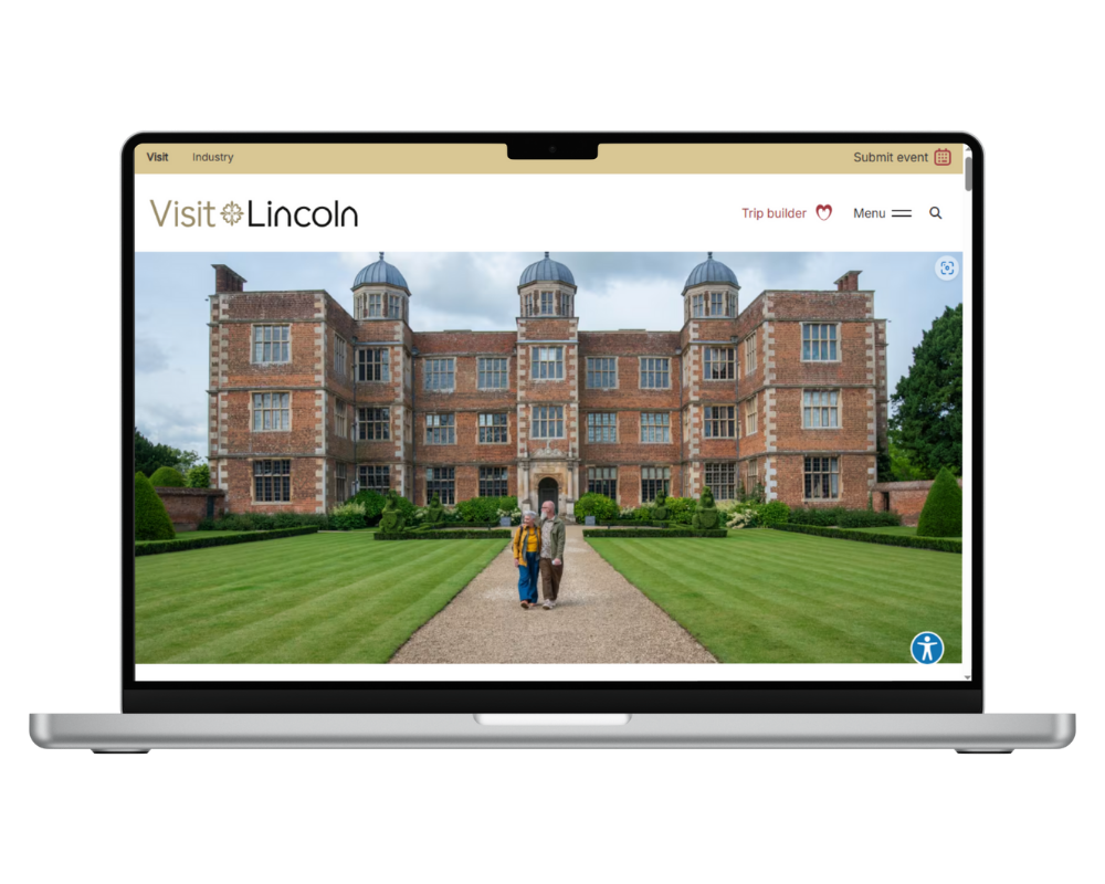 a mock up of a laptop screen with the Visit Lincoln website