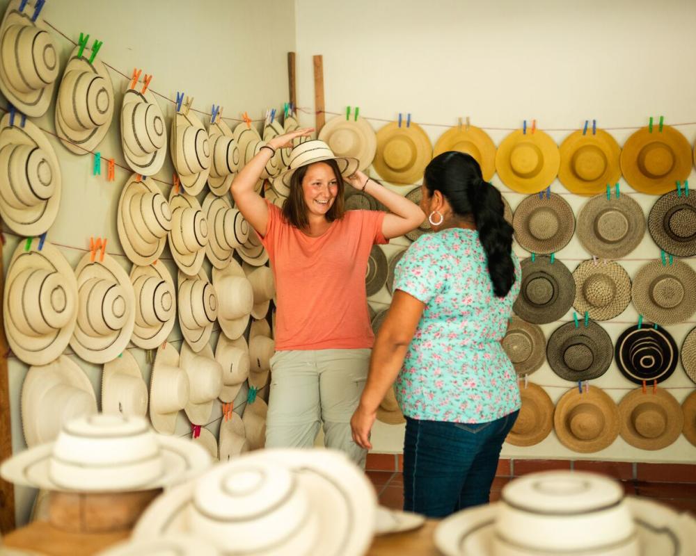Trying on a pintao hat in La Pintada, Penonome, Cocle Province, Panamá
