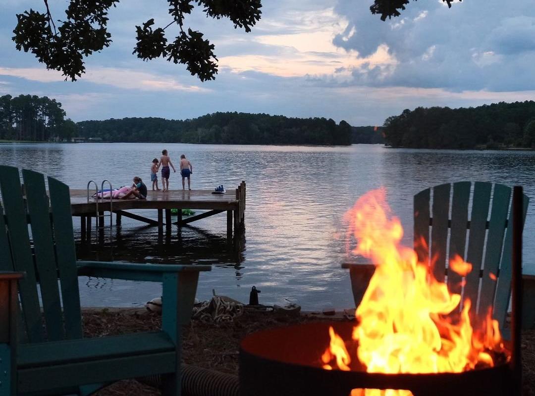 kids on dock and fire pit on lake sinclair vacation rental