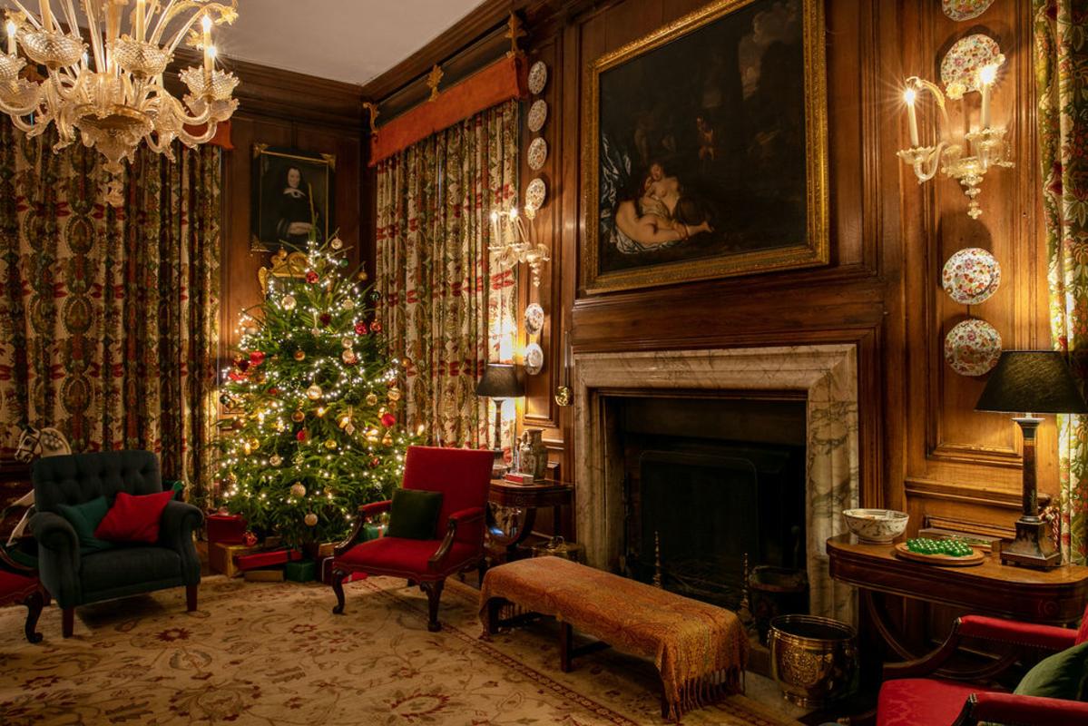 A living room at Doddington Hall, decorated with beautiful Christmas decorations