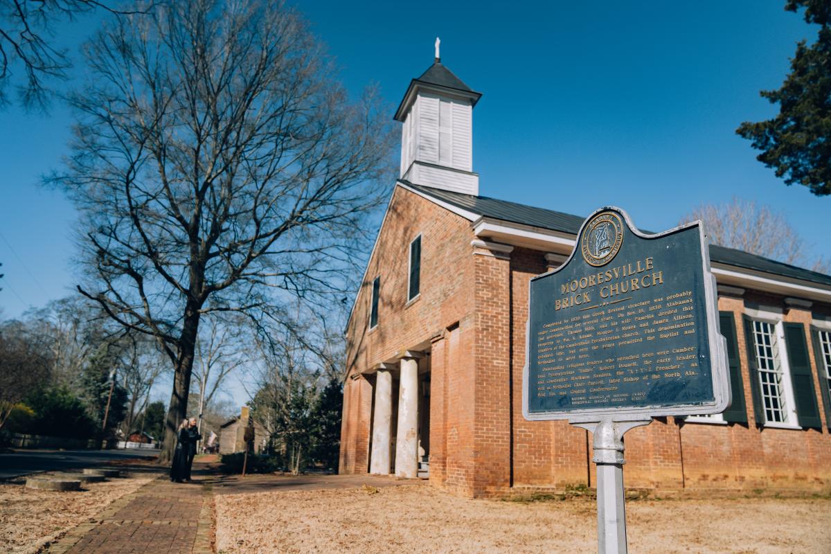 A historic brick church building.