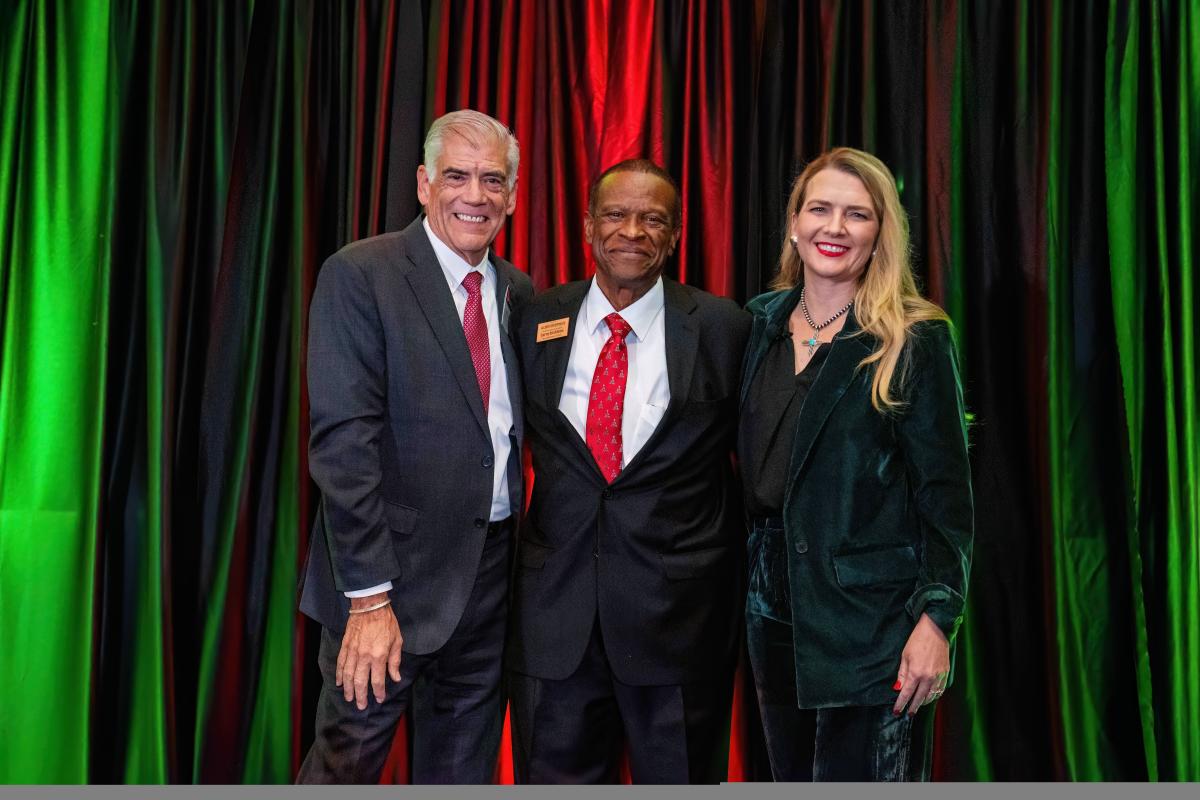 Visit Albuquerque Board Chair Mike Canfield, Associate Director of Sales Larry Atchison and President/CEO Tania Armenta at the Visit Albuquerque Holiday Party