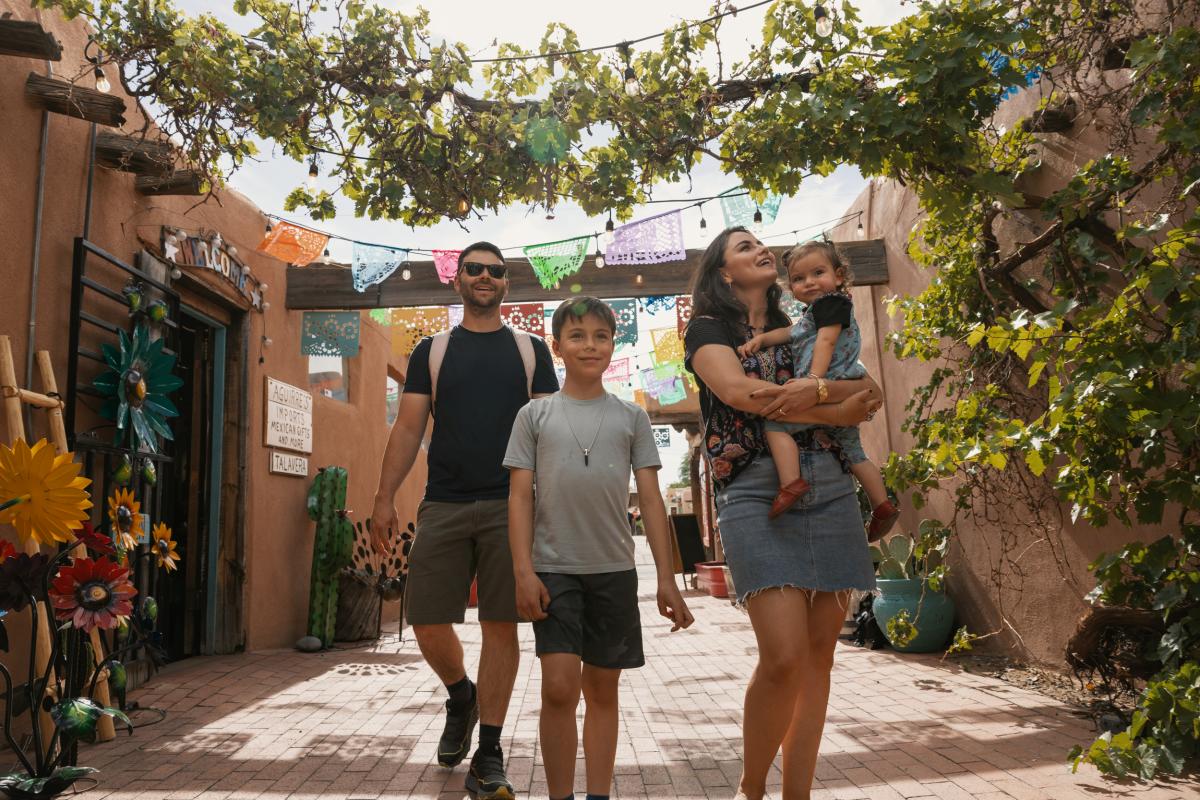 A family walks in Old Town.