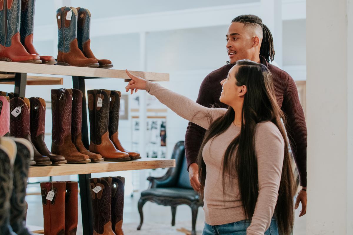Couple shopping for cowboy boots at Beck Boots in Amarillo, Texas