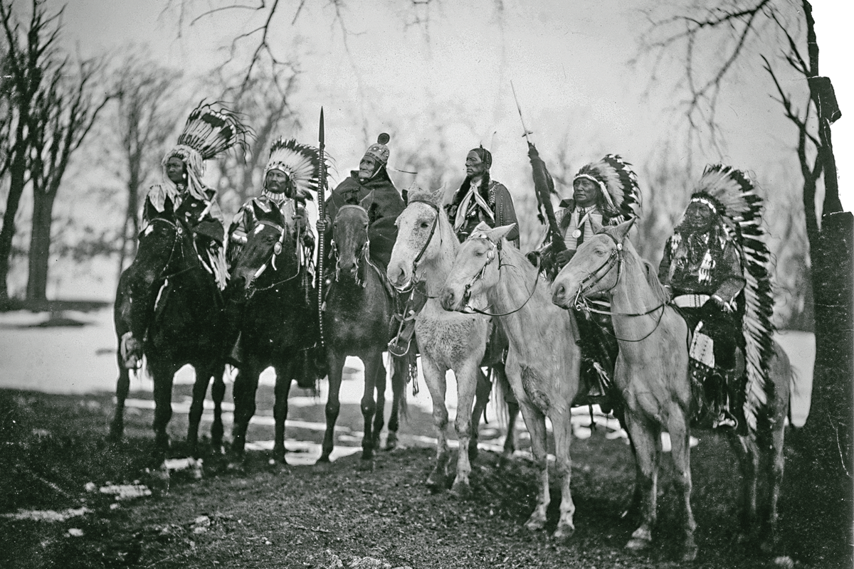 6 native american leaders on horses