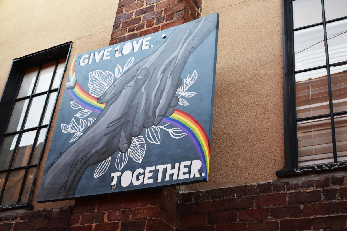 Give Love Together mural in Athens Mural Alley