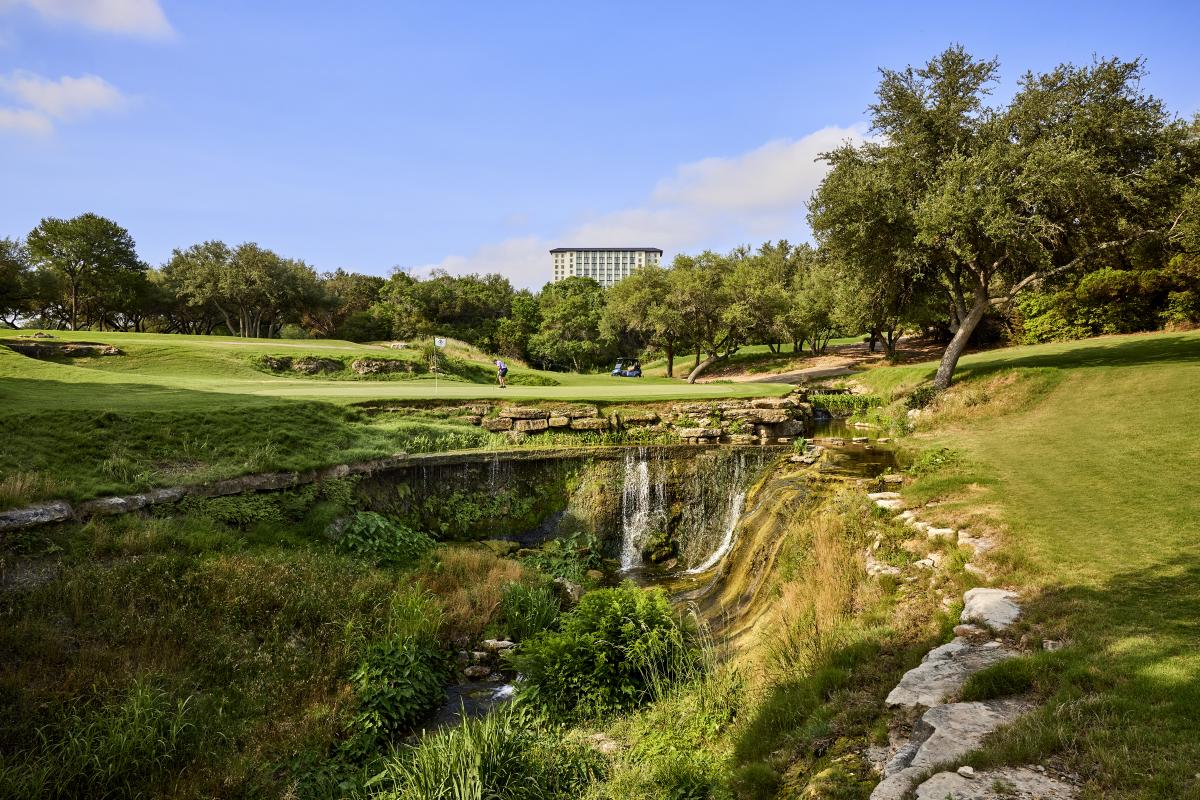 Image of the waterfall on hole 16 at Omni Barton Creek golf course.