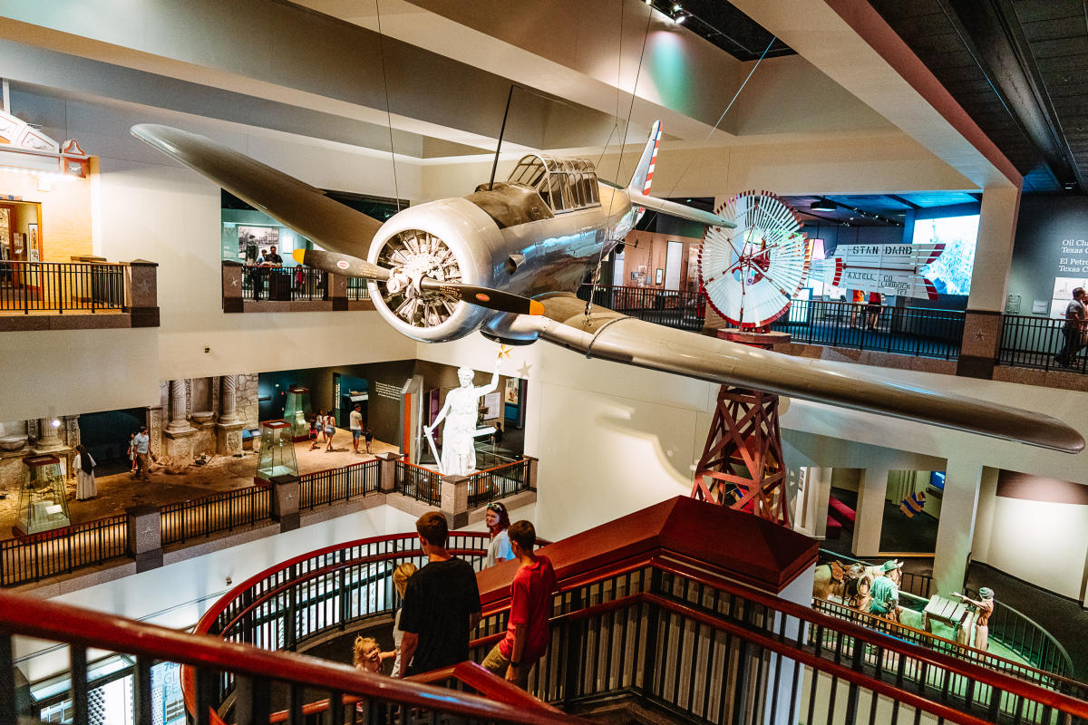 Image of the plane hanging on the top floor of the Bullock State History Museum.