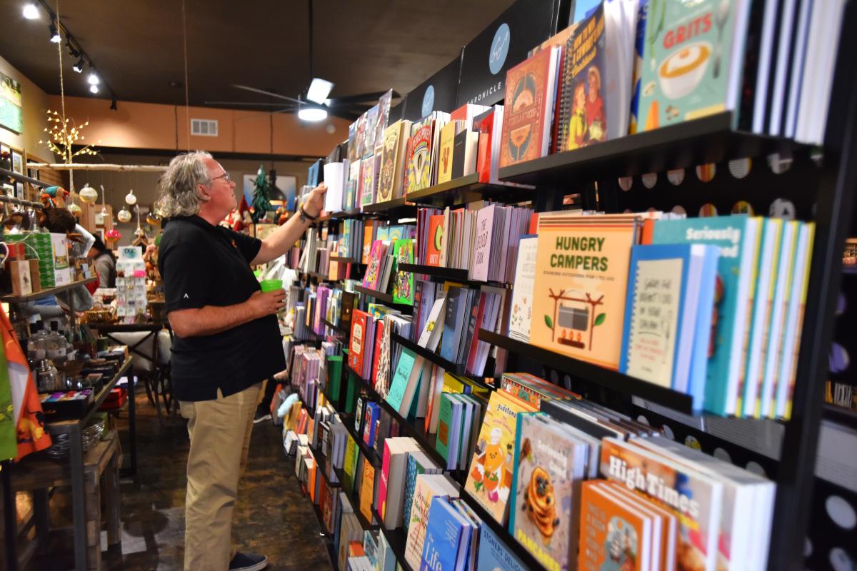 Wassail Fest Participant Shopping Downtown Bastrop