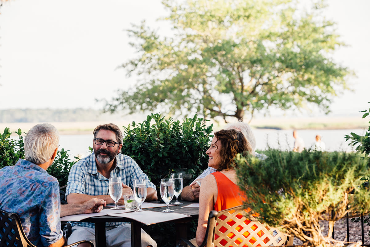 Friends dining outdoors