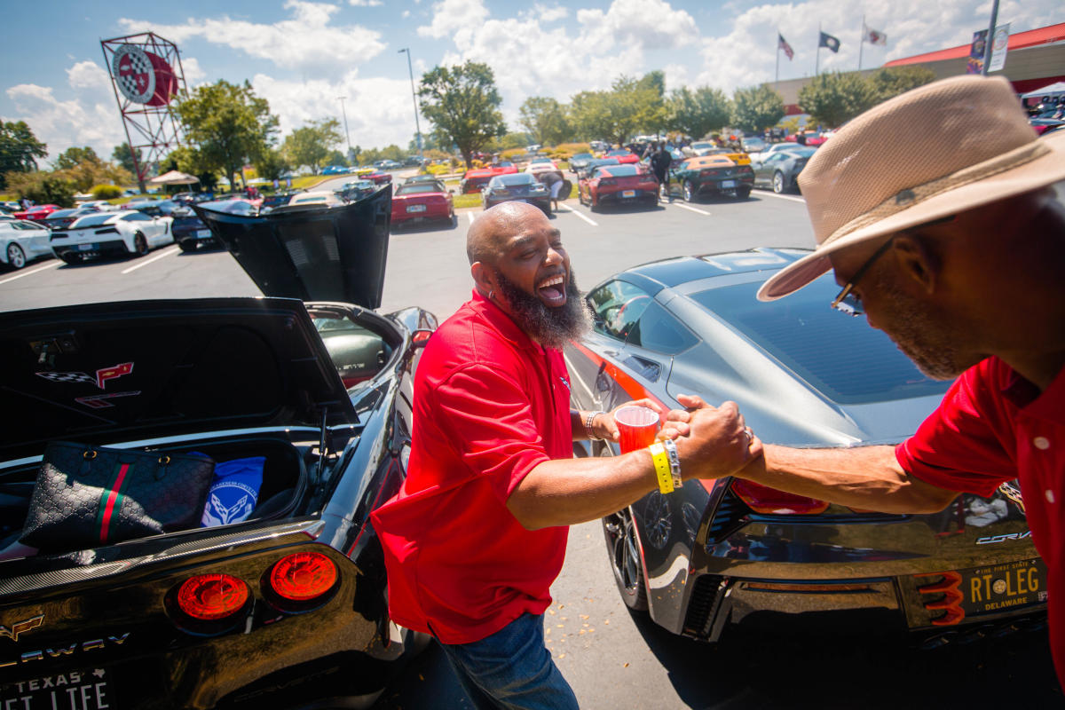 A Man greeting his friend at Cultural Awareness Corvette Weekend in Bowling Green, Ky.