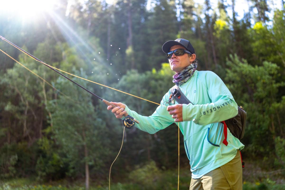 A man fly fishing in Spearfish, SD.