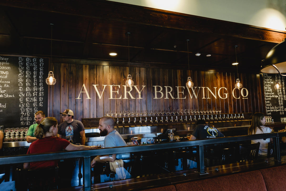 People gathering at Avery Brewing Tap Room in Boulder, CO. 