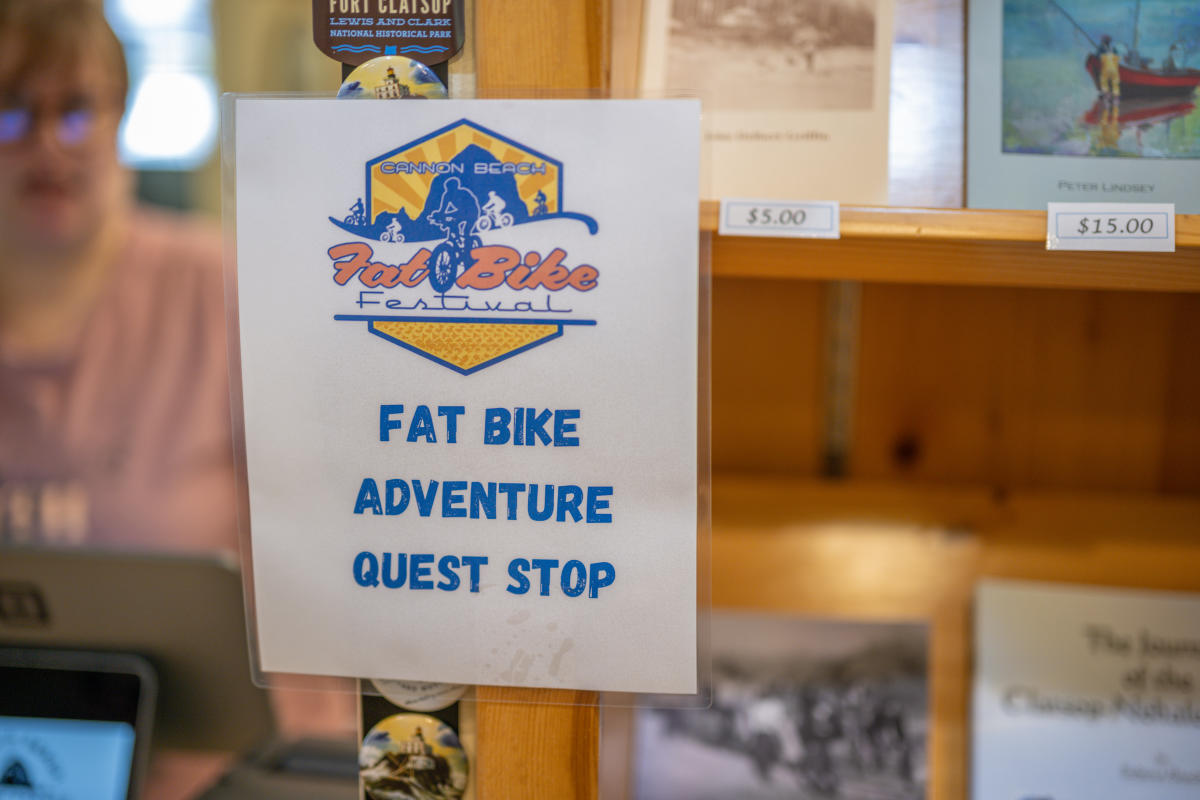 A sign recognizing a stop along the "Adventure Quest" trail during the Fat Bike Festival