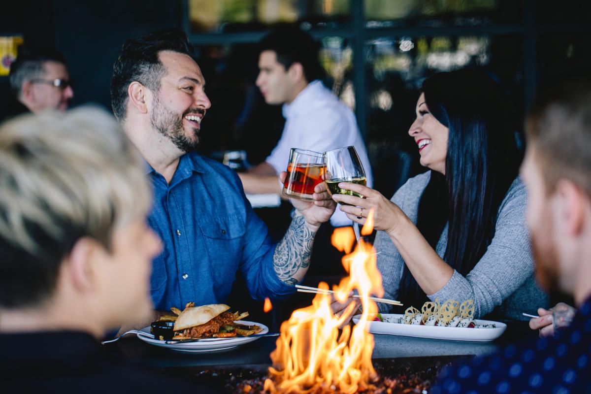 Couple Enjoying Happy Hour at Thirsty Lion Gastropub