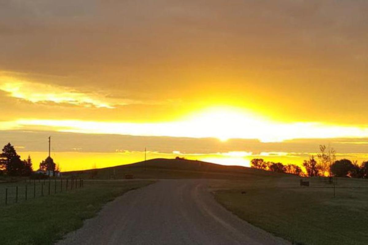 The sun sets over Last Chance Camp, a top spot for RV camping in Cheyenne.