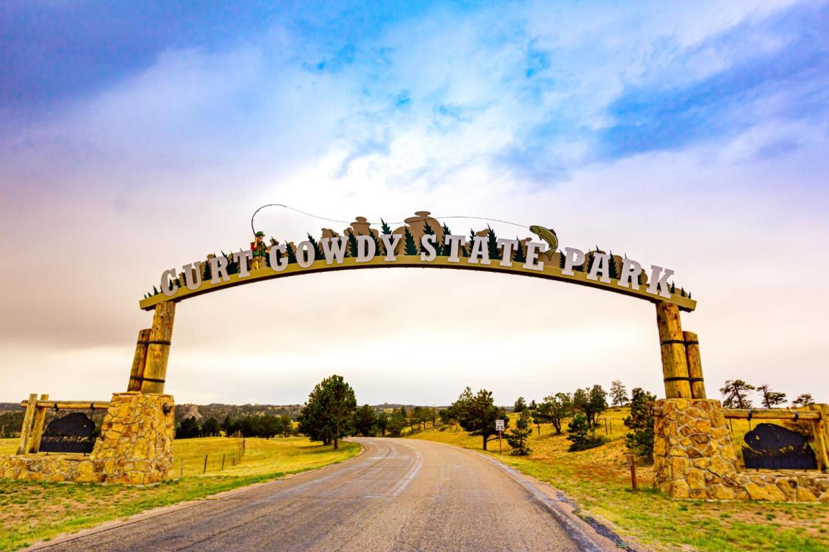 Entrance to Curt Gowdy State Park, welcoming families to outdoor adventures and natural beauty.