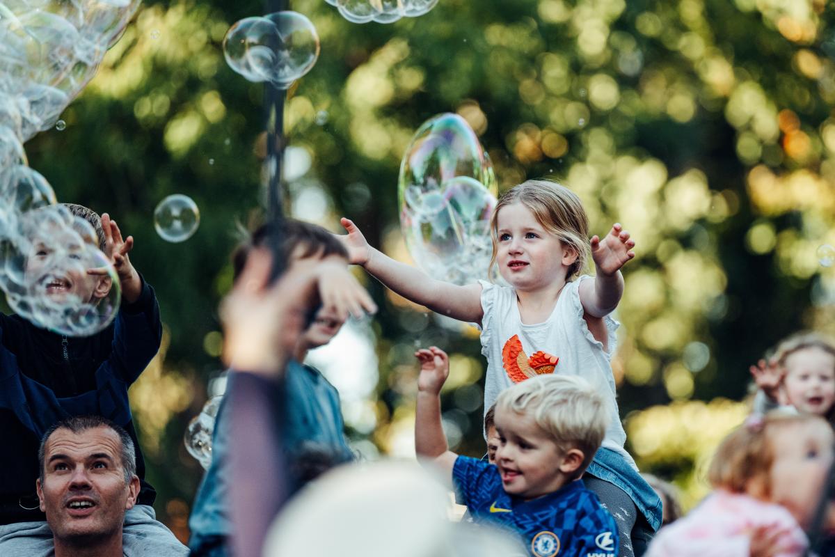 Children playing with bubbles