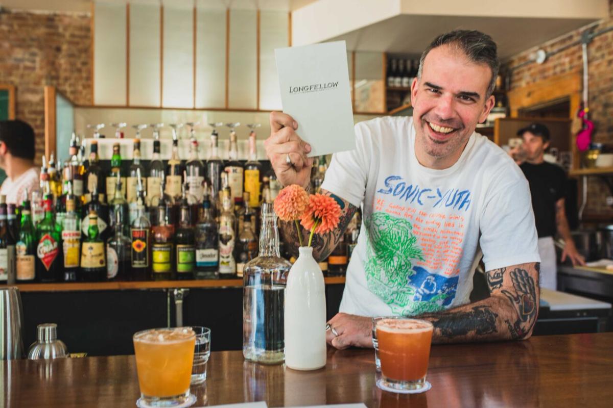 Bartender behind bar