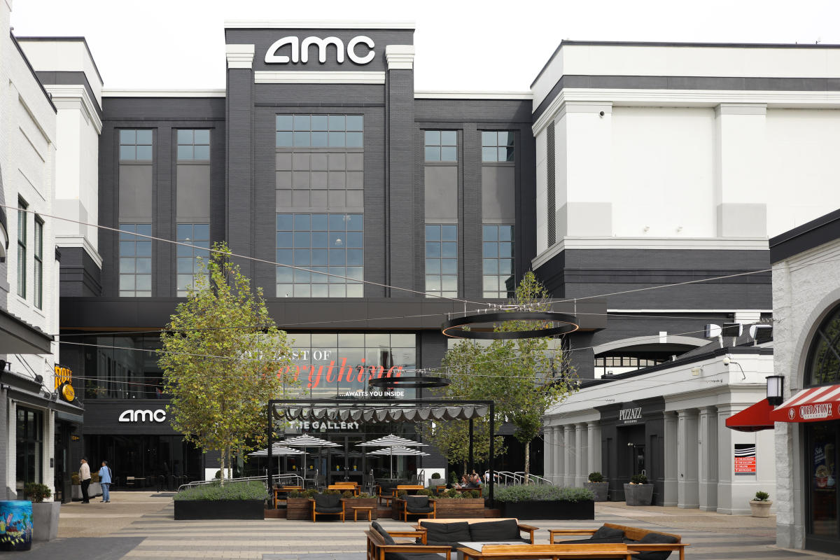 Image is of the outside facade of Newport on the Levee's AMC building.