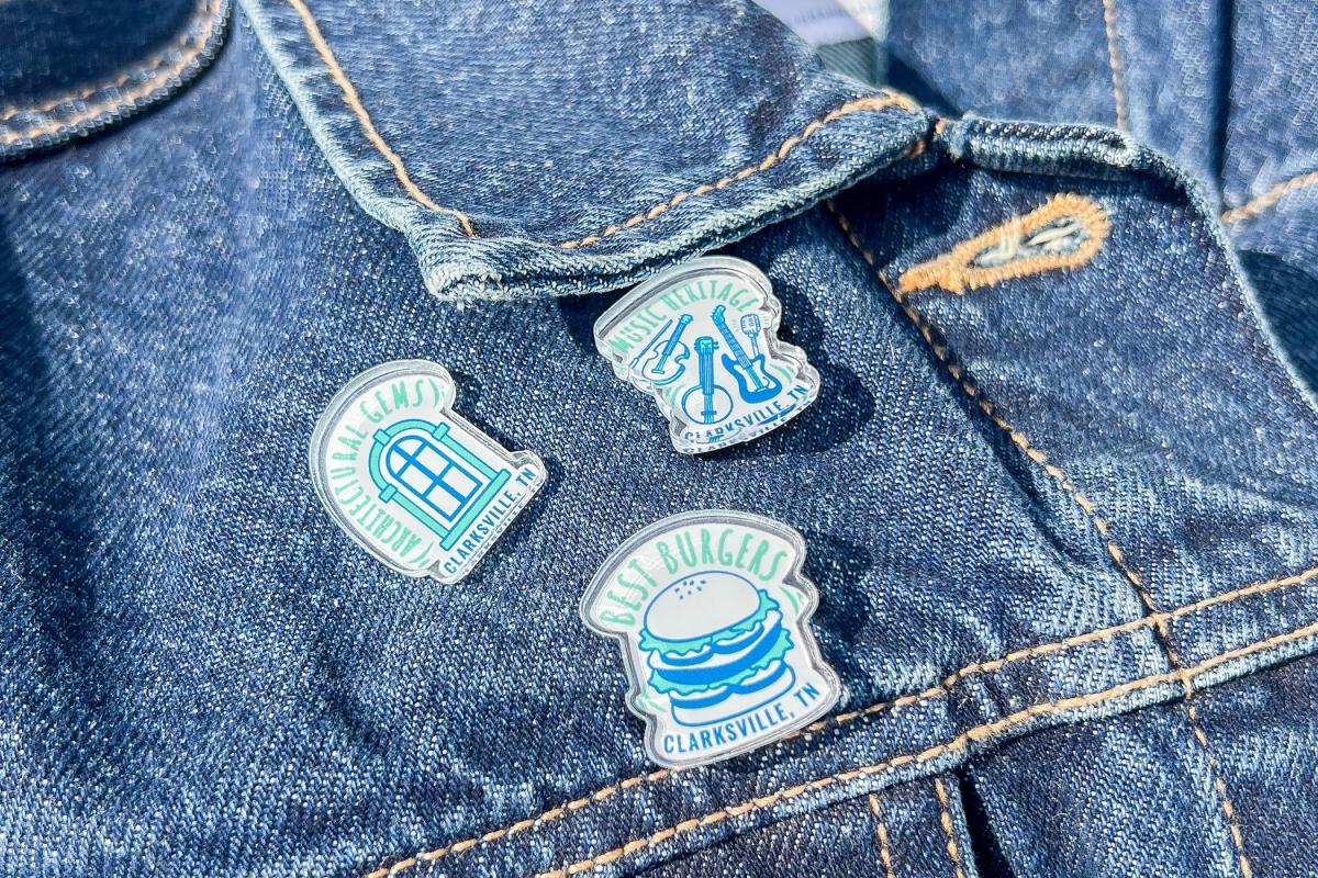 denim jacket with three collectible pins