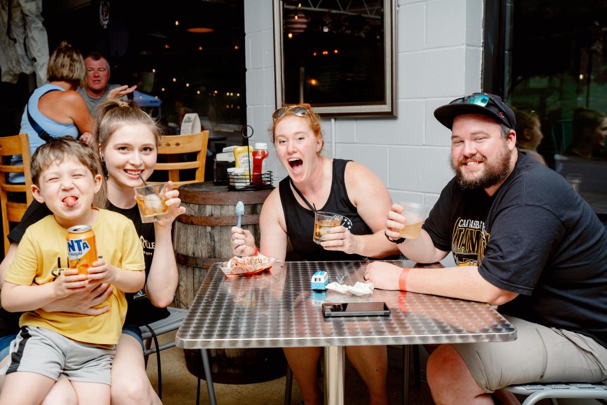 family at a brewery