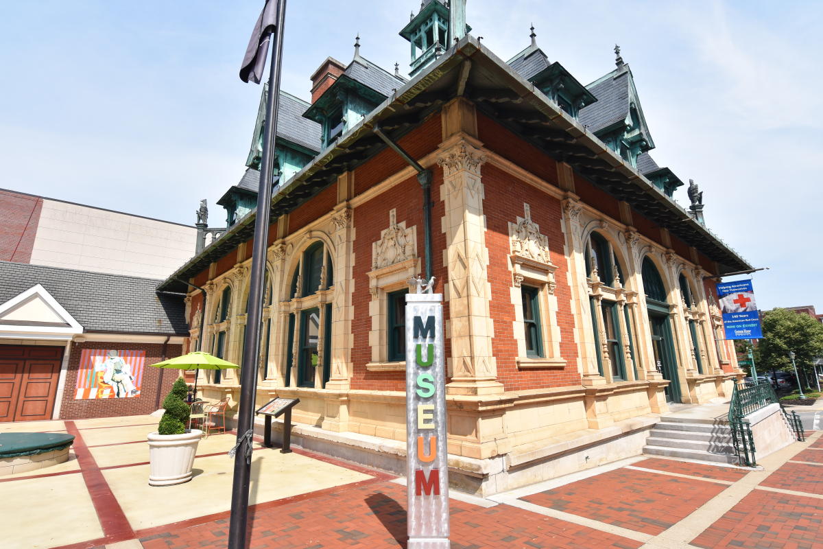 historic building with museum sign in front