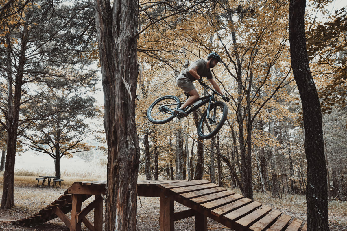 mountain biker going over a jump