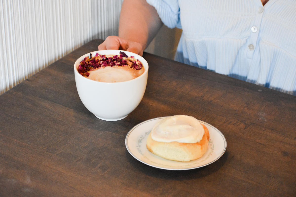 coffee and pastry sitting on table