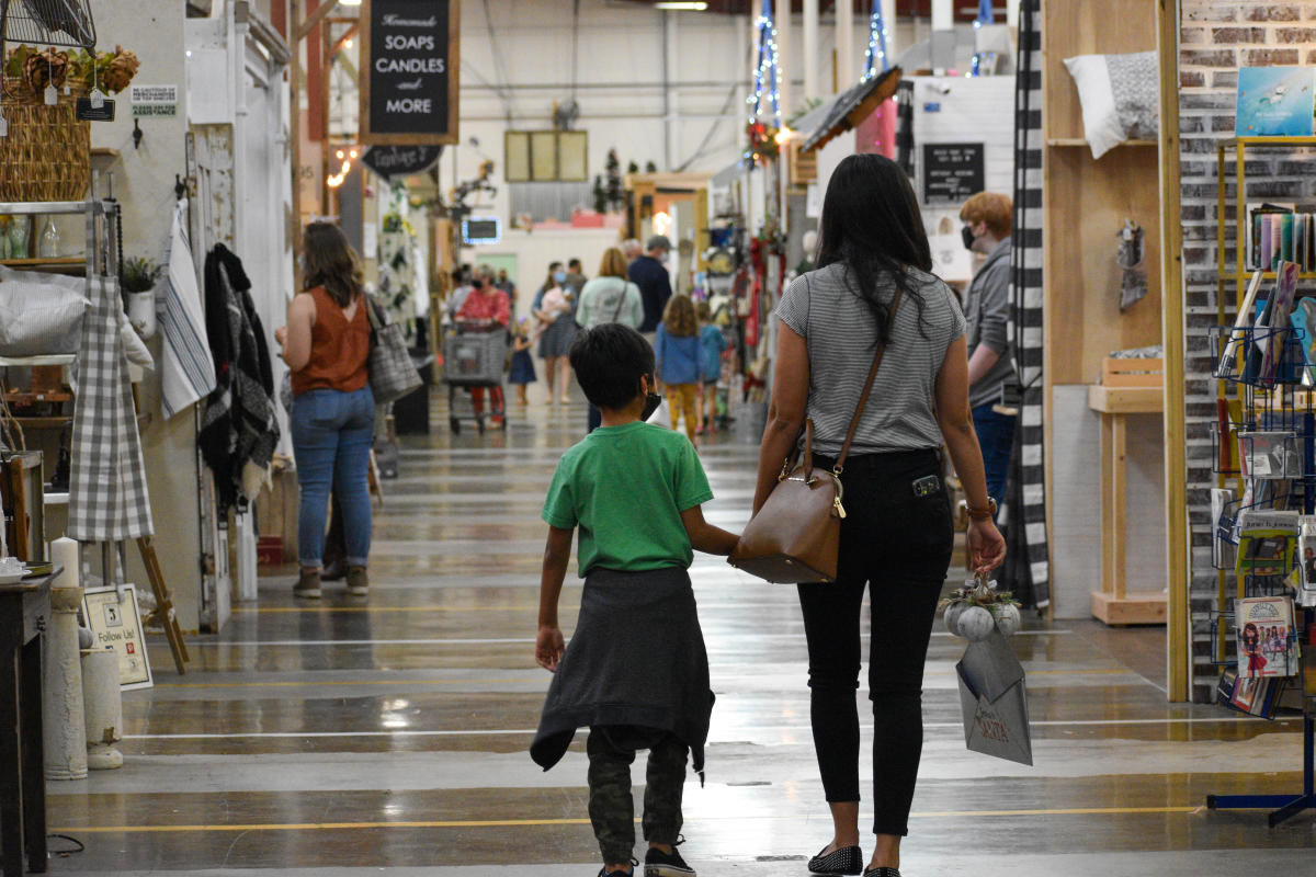 family shopping in an indoor market