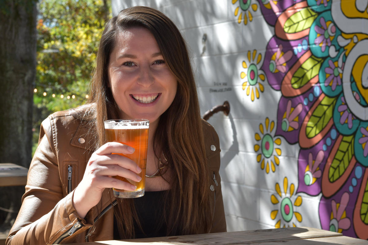 lady having a drink on a patio