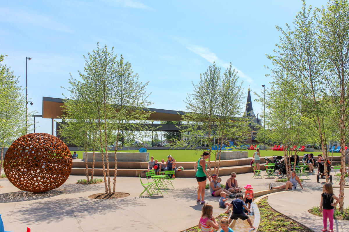 kids playing an a large urban park