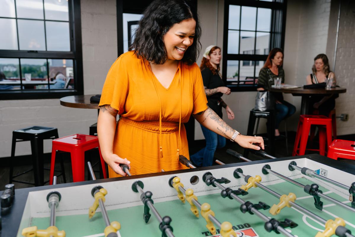 couple plays games upstairs at strawberry