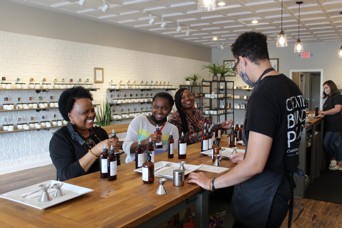 people in a candle-making workshop