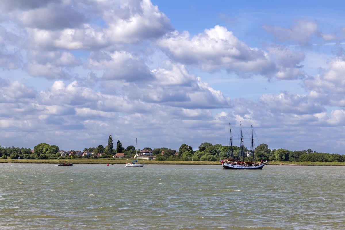 Open body of water at Mersea Island, with boats on the lake.
