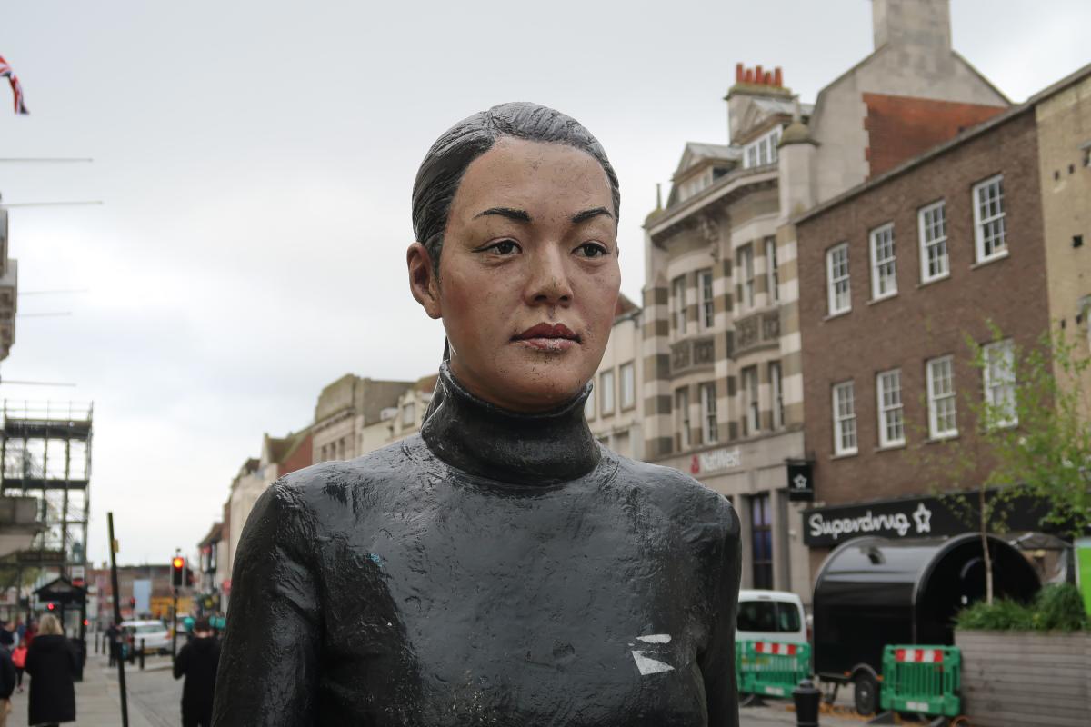 The Walking Women Statue in the High Street.
