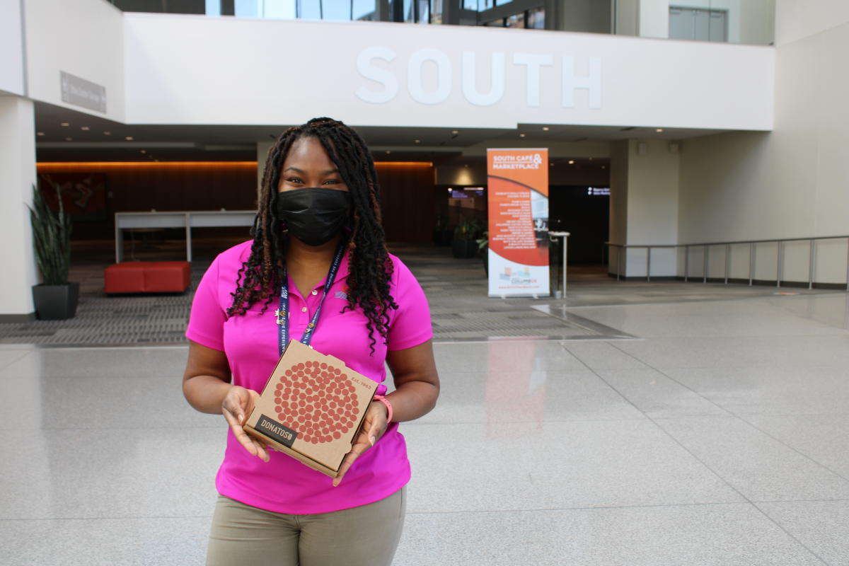 Greater Columbus Convention Center's Leslie Nutter with Donatos Pizza