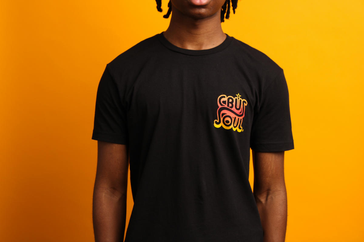 Black t-shirt with red, orange and yellow CBUS Soul® logo over heart area
