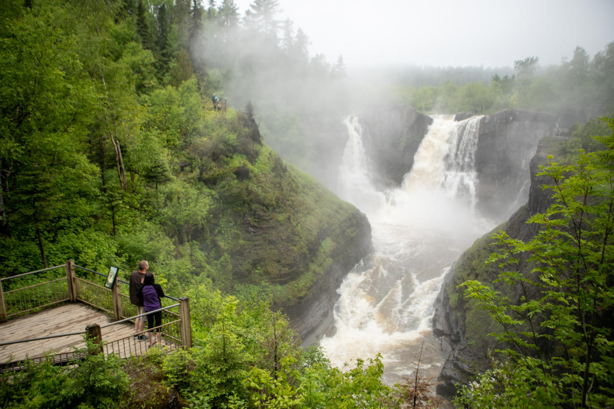 Grand Portage Waterfall with two people