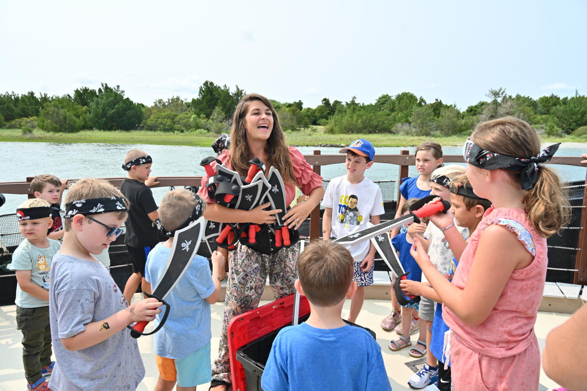 Handing Out Swords on Pirates Revenge