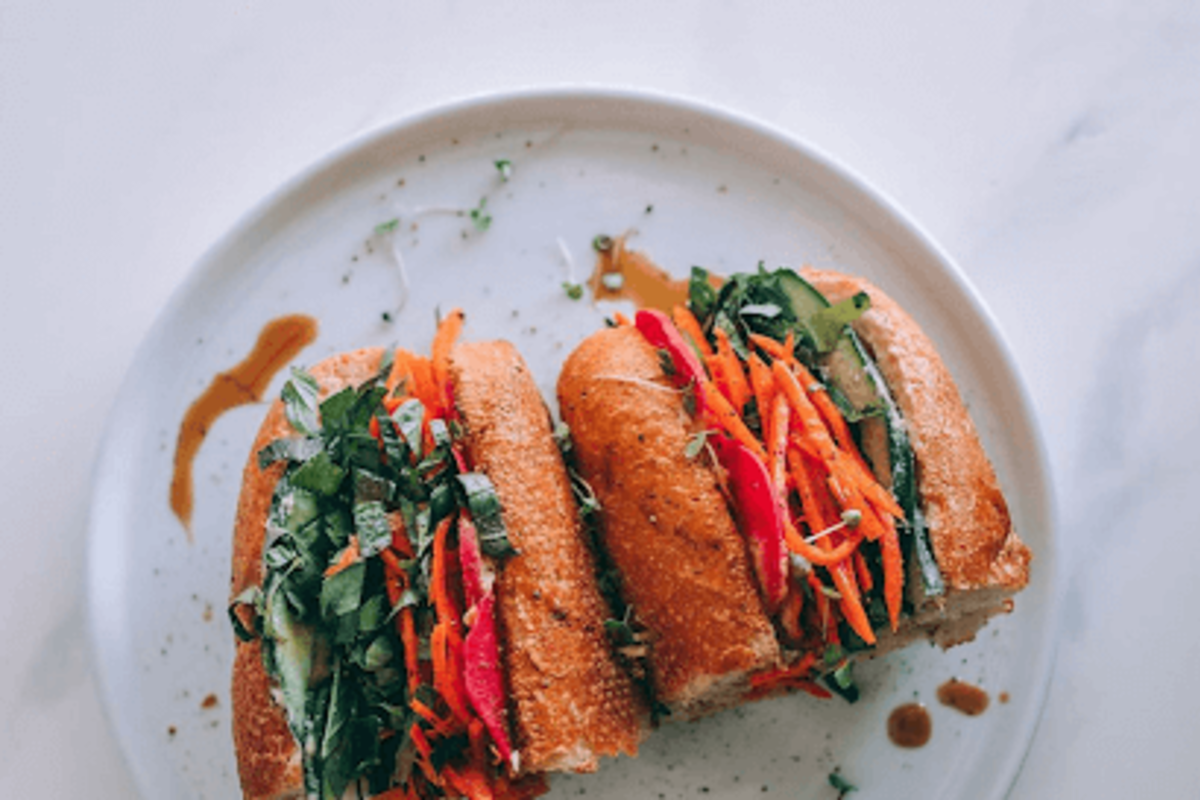 Veggie Banh Mi from Organic tree with Hummus. Ginger. Lime. Jalapeño. Pickled Carrot. Cucumber. Pickled Radish. Herbs