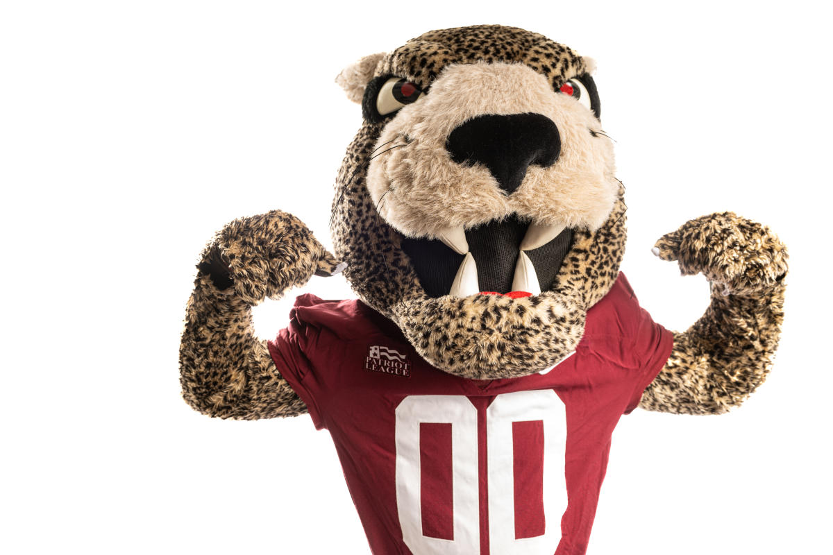 Lafayette College's mascot, The Leopard flexes his muscles