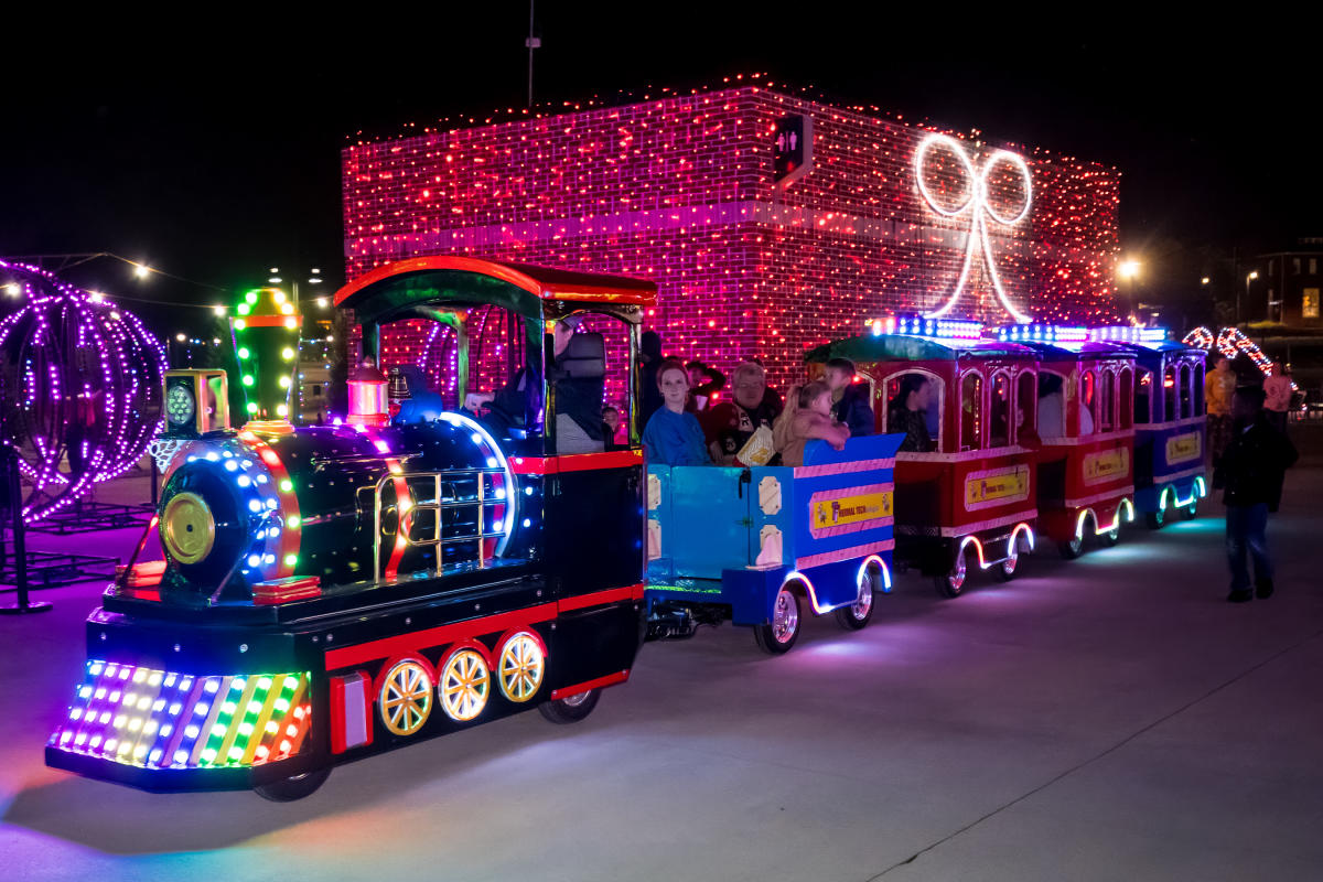 A train decorated with Christmas lights on the baseball field at Illumination at Coca-Cola Park in Allentown, PA.