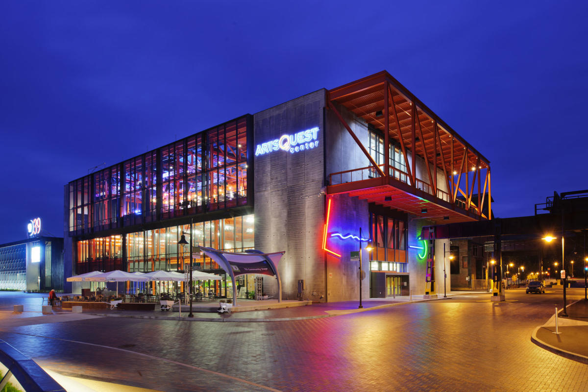 Exterior of ArtsQuest™ Center at SteelStacks™ with bright lights