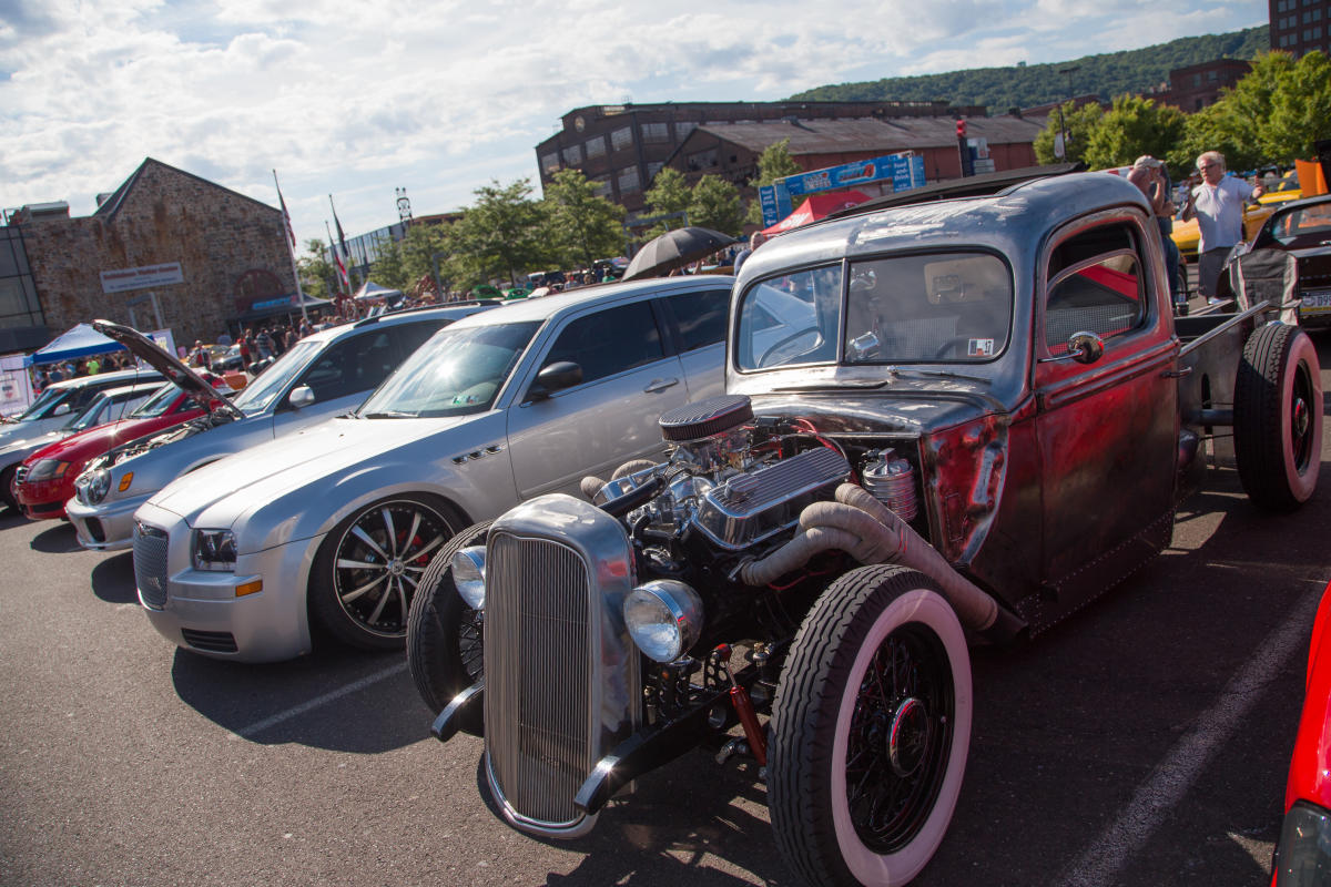 A variety of cars displayed at Cars & Coffee at SteelStacks in Bethlehem, PA